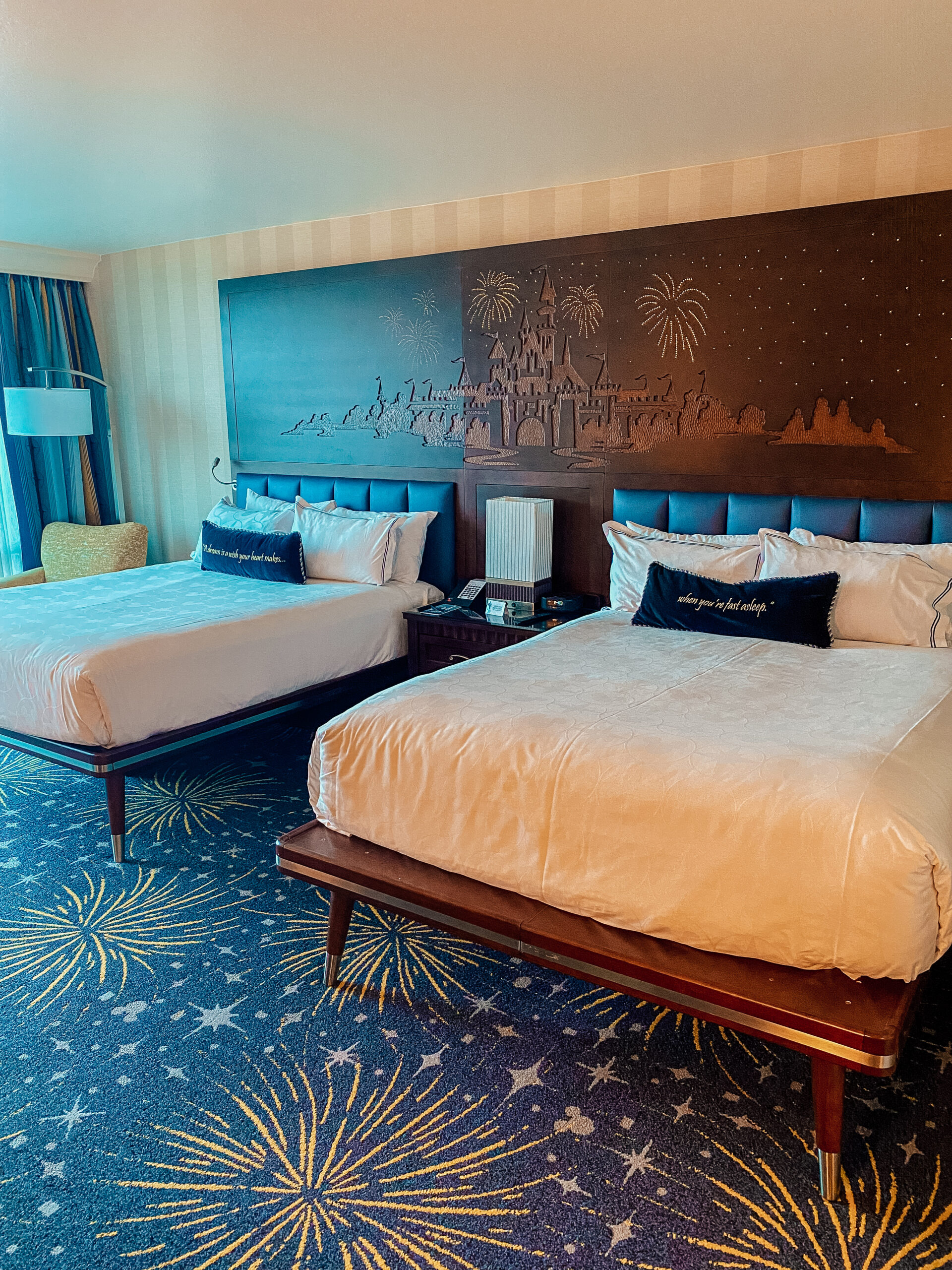 Disneyland Hotel rooms with either 2 queen beds or 1 king bed.